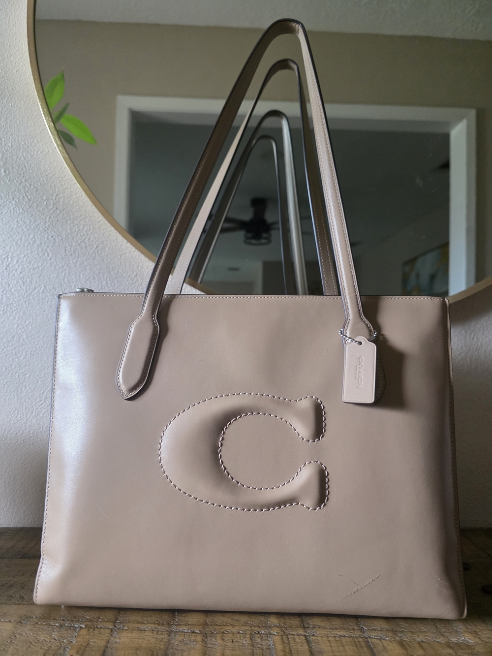 Coach Beige Leather Tote with Embossed 'C'